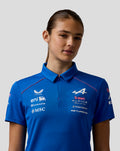 Close-up of the blue BWT Alpine polo chest area showing sponsor logos.