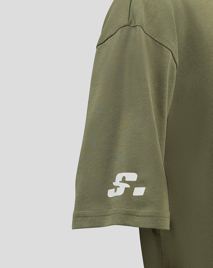 Olive green junior T shirt short sleeve with small white stylized logo near the hem.