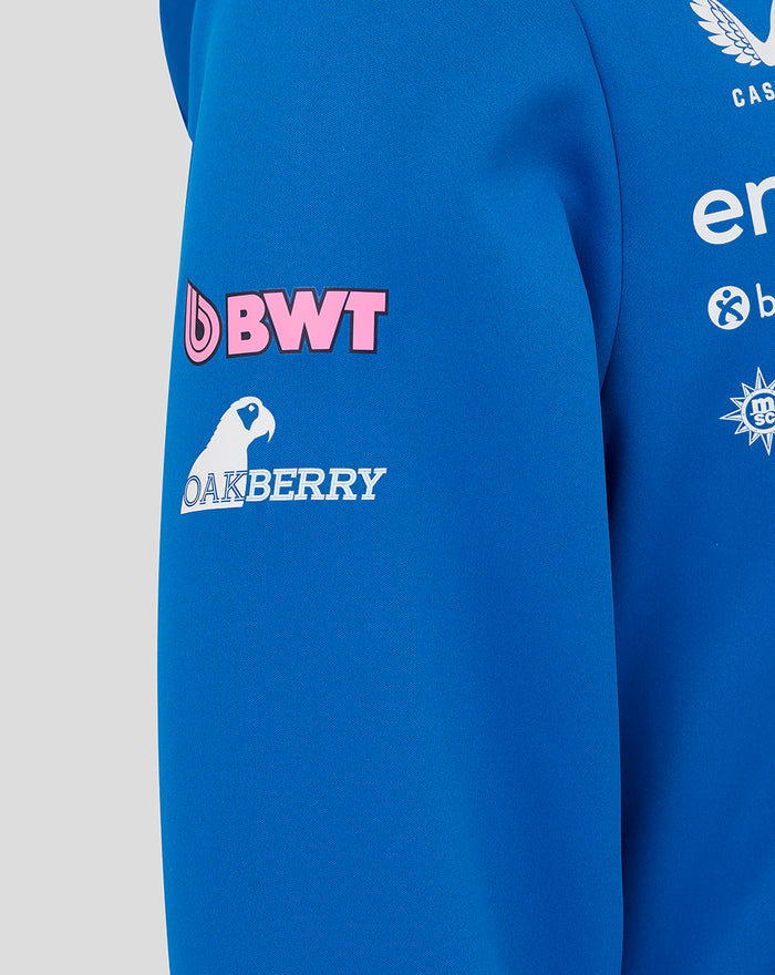 Blue hoodie sleeve with pink BWT logo and Oakberry graphic.