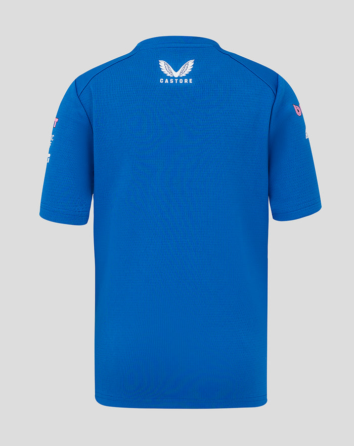 Back view of a bright blue Junior Driver T shirt with white Castore emblem on the upper back and sponsor logos on the sleeve