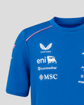 Blue junior Formula One team T shirt front chest with sponsor logos and pink shoulder piping
