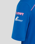 Close-up of blue polo shirt sleeve displaying BWT logo and Oakberry branding from a different angle.