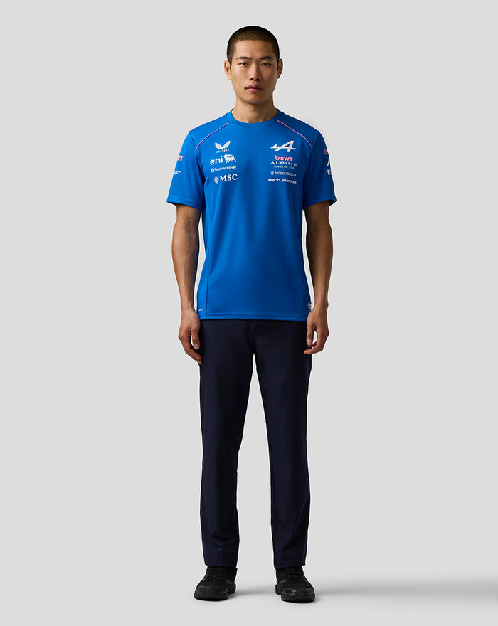 Front view of a male model in a blue BWT Alpine Formula One Team Set Up T Shirt featuring chest logos and contrast piping along the shoulders.