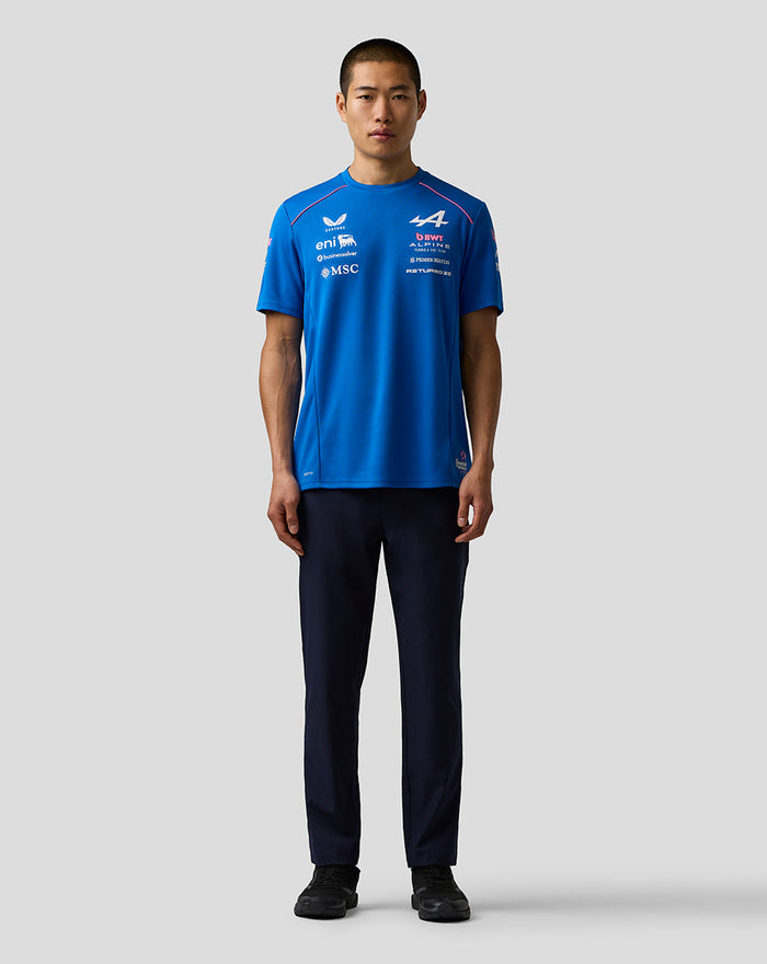 Male model wearing blue BWT Alpine Formula One Team T shirt with sponsor logos across the chest.