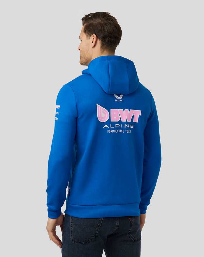 Back view of a blue BWT Alpine hoodie with a large pink BWT logo on the back.
