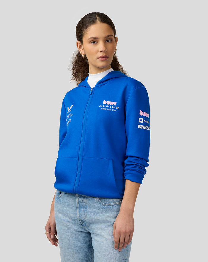 Model wearing lapis blue BWT Alpine Formula One Team full zip hoodie with front pockets and branding