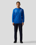 Blue BWT Alpine Formula One Team zip hoodie on a male model front view with multiple sponsor logos on chest and sleeves