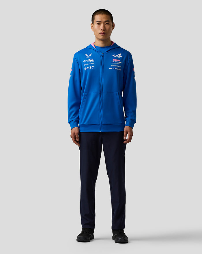 Blue BWT Alpine Formula One Team zip hoodie on a male model front view with multiple sponsor logos on chest and sleeves
