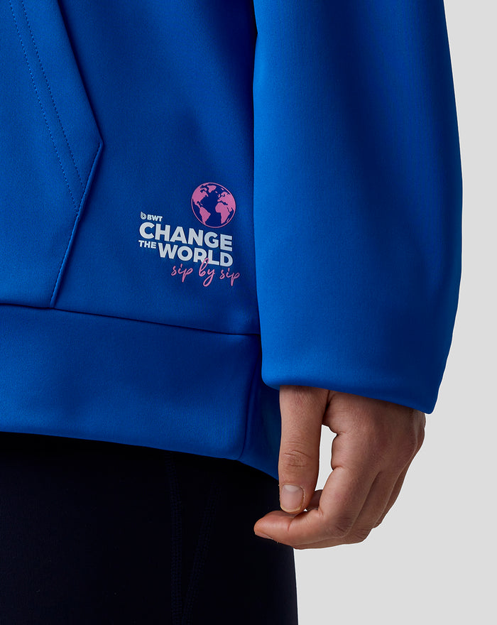 Blue BWT Alpine Formula One Team hoodie close-up showing globe graphic and change the world text on the chest.