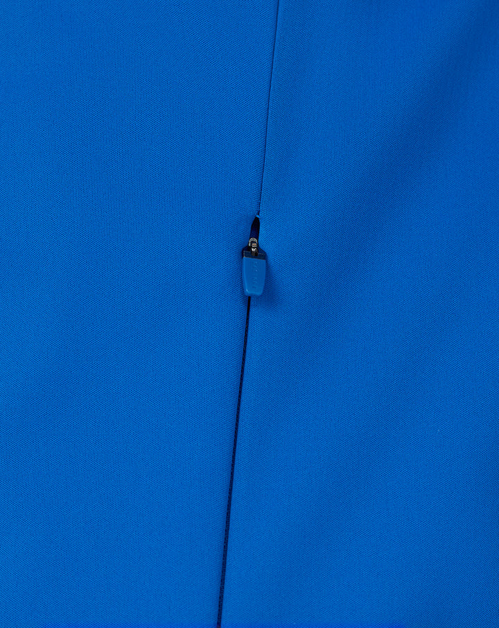 Close-up of center front blue zip with guard on the Official BWT Alpine Formula One Team Soft Shell Jacket