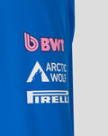 Lower back of blue rain jacket with Change the World graphic and sponsor logos
