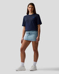 Navy Night Sky unisex core T shirt with blue embroidered A on left chest worn by a model