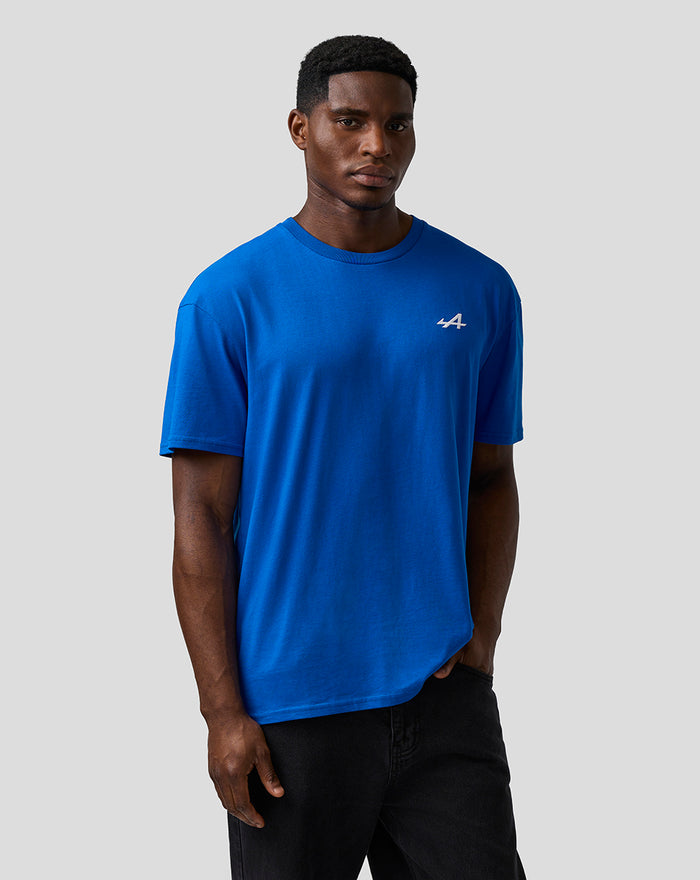 Male model in lapis blue T shirt with white embroidered A logo on the chest