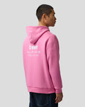 Male model in pink hoodie seen from behind with BWT Alpine logo on the back.