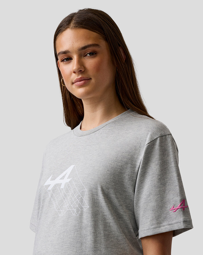 Woman wearing grey marl unisex regular fit graphic T shirt with white Alpine chest graphic and pink Alpine A embroidery on sleeve